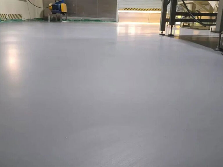A clean and seamless KAIDA PAINT waterborne urethane mortar floor installed in a soybean processing plant, showing a hygienic and durable surface.