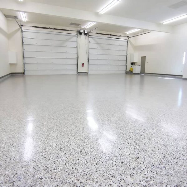Multiple epoxy garage floor color options with different flake blends including gray, tan and custom decorative finishes