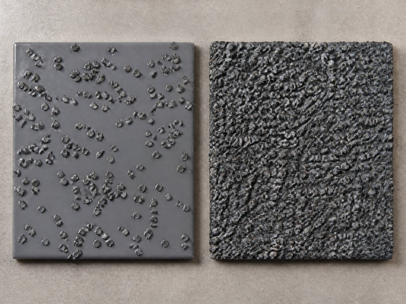Comparison of two resin floor samples side by side showing light and heavy aggregate broadcast and the resulting surface profile